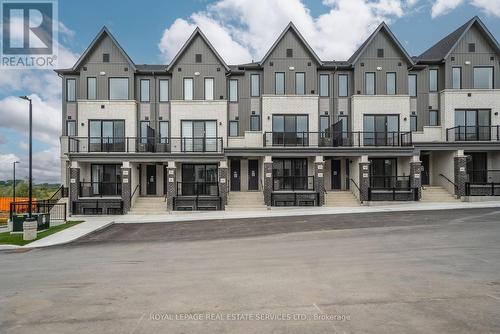 204 - 160 Densmore Road, Cobourg, ON - Outdoor With Facade