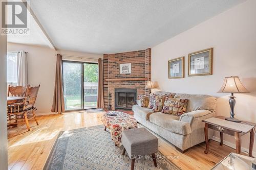 6930 Cordingley Crescent, Mississauga, ON - Indoor Photo Showing Living Room With Fireplace