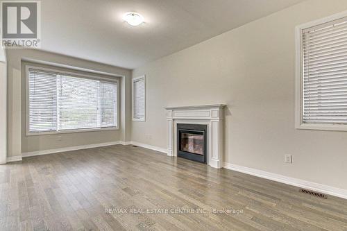 109 Huntingford Trail, Woodstock, ON - Indoor With Fireplace