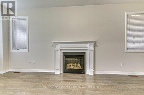 109 Huntingford Trail, Woodstock, ON - Indoor With Fireplace