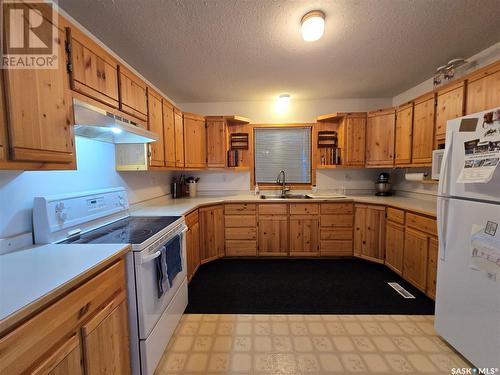 891 107Th Street, North Battleford, SK - Indoor Photo Showing Kitchen With Double Sink