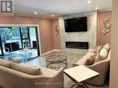 499 Reynolds Street, Whitby, ON - Indoor Photo Showing Living Room With Fireplace