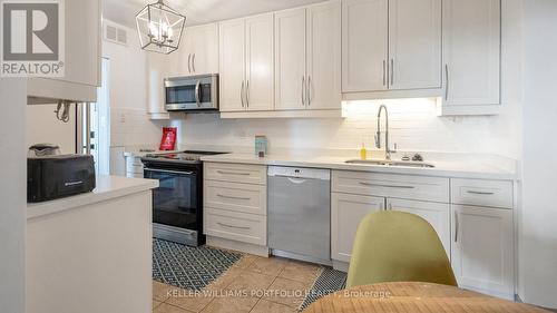 1006 - 362 The East Mall E, Toronto, ON - Indoor Photo Showing Kitchen With Double Sink With Upgraded Kitchen