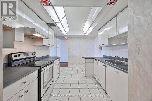 2205 - 131 Torresdale Avenue, Toronto, ON - Indoor Photo Showing Kitchen With Double Sink