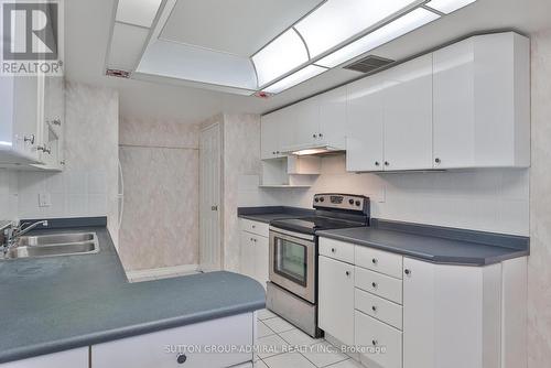 2205 - 131 Torresdale Avenue, Toronto, ON - Indoor Photo Showing Kitchen With Double Sink