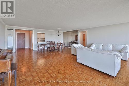 2205 - 131 Torresdale Avenue, Toronto, ON - Indoor Photo Showing Living Room