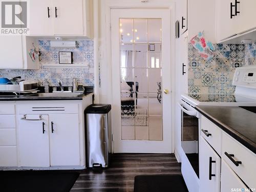 219 2Nd Avenue E, Rosetown, SK - Indoor Photo Showing Kitchen With Double Sink