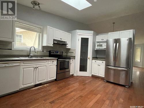 235 Beerling Crescent, Saskatoon, SK - Indoor Photo Showing Kitchen With Double Sink