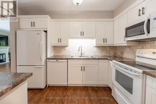 212 - 10 Coulter Street, Barrie, ON - Indoor Photo Showing Kitchen With Double Sink