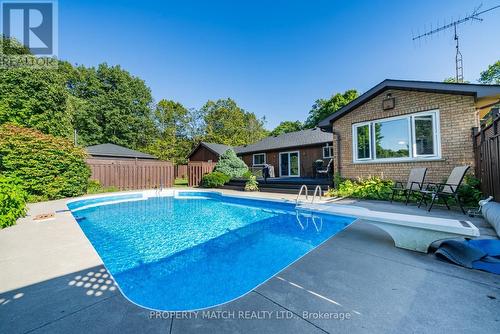 9838 Ellis Road, Hamilton Township, ON - Outdoor With In Ground Pool With Backyard