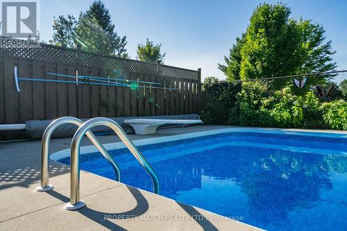 9838 Ellis Road, Hamilton Township, ON - Outdoor With In Ground Pool