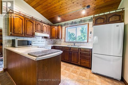 9838 Ellis Road, Hamilton Township, ON - Indoor Photo Showing Kitchen With Double Sink