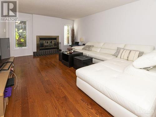 23 Pittaway Avenue, Ottawa, ON - Indoor Photo Showing Living Room With Fireplace