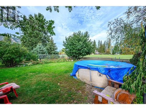 773 Heather Road, Lumby, BC - Outdoor With Above Ground Pool With Backyard