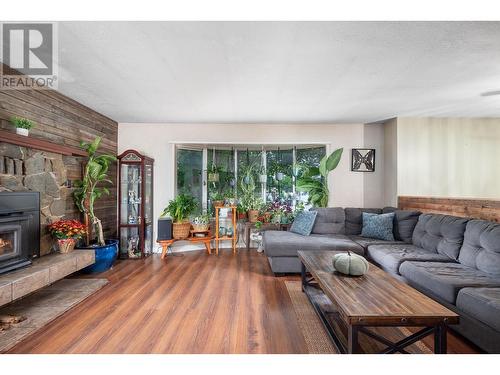 773 Heather Road, Lumby, BC - Indoor Photo Showing Living Room With Fireplace