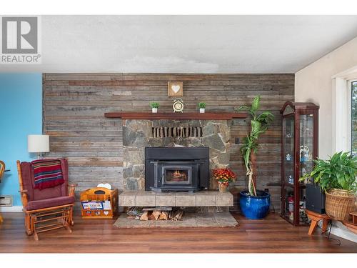 773 Heather Road, Lumby, BC - Indoor Photo Showing Living Room With Fireplace