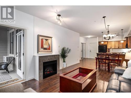 3739 Casorso Road Unit# 118, Kelowna, BC - Indoor Photo Showing Living Room With Fireplace