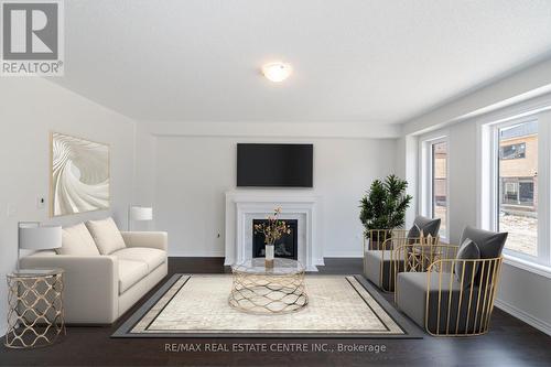 28 Rochester Drive, Barrie, ON - Indoor Photo Showing Living Room With Fireplace