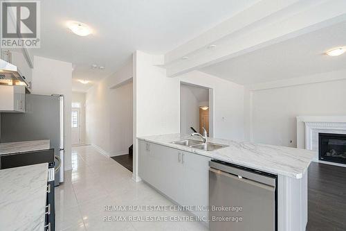 28 Rochester Drive, Barrie, ON - Indoor Photo Showing Kitchen With Fireplace With Double Sink