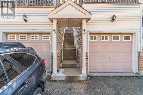 49 - 1489 Heritage Way, Oakville, ON -  Photo Showing Garage