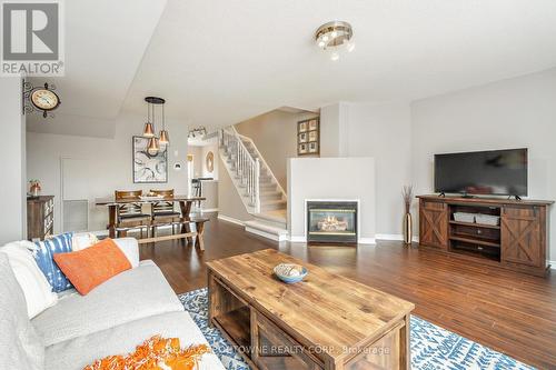 49 - 1489 Heritage Way, Oakville, ON - Indoor Photo Showing Living Room With Fireplace