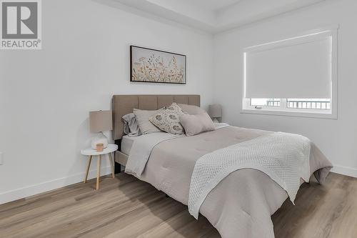 1057 Frost Road Unit# 105, Kelowna, BC - Indoor Photo Showing Bedroom