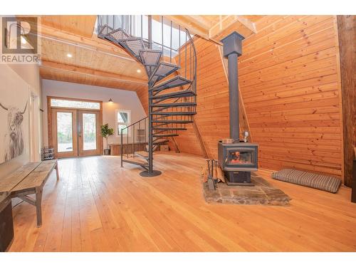 2140 Saddleview Avenue, Lumby, BC - Indoor With Fireplace