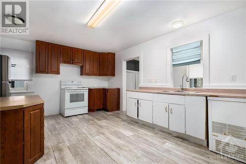 90 Main Street E, Smiths Falls, ON - Indoor Photo Showing Kitchen With Double Sink