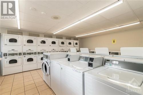 shared laundry - 915 Elmsmere Road Unit#403, Ottawa, ON - Indoor Photo Showing Laundry Room