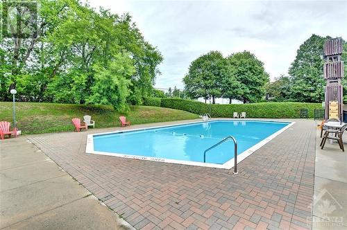 915 Elmsmere Road Unit#403, Ottawa, ON - Outdoor With In Ground Pool With Backyard