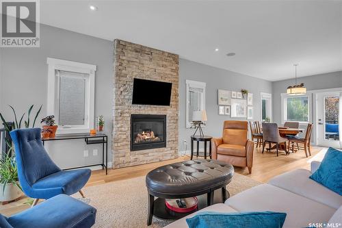 446 Mahabir Crescent, Saskatoon, SK - Indoor Photo Showing Living Room With Fireplace