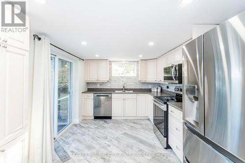 1144 North Bay Drive, Kawartha Lakes, ON - Indoor Photo Showing Kitchen With Stainless Steel Kitchen With Double Sink