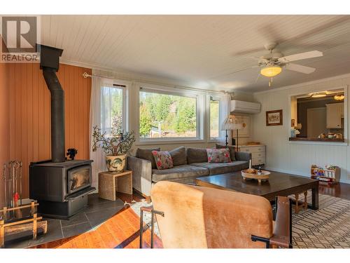 2396 Nault  Road, Castlegar, BC - Indoor Photo Showing Other Room With Fireplace