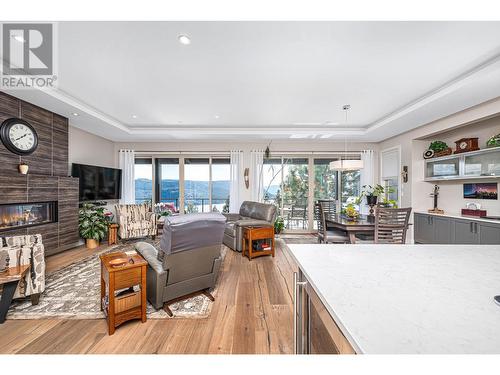 8972 Bayswater Place, Vernon, BC - Indoor Photo Showing Living Room With Fireplace