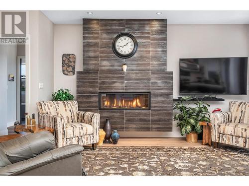 8972 Bayswater Place, Vernon, BC - Indoor Photo Showing Living Room With Fireplace