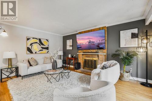 14 Jill Crescent, Brampton, ON - Indoor Photo Showing Living Room With Fireplace