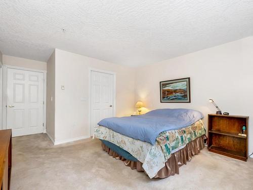 102-9993 Fourth St, Sidney, BC - Indoor Photo Showing Bedroom