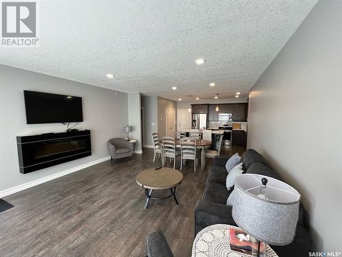 103 2800 Lakeview Drive, Prince Albert, SK - Indoor Photo Showing Living Room With Fireplace