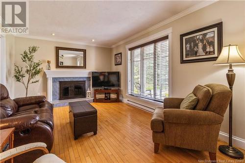 213 Orlean, Dieppe, NB - Indoor Photo Showing Living Room With Fireplace