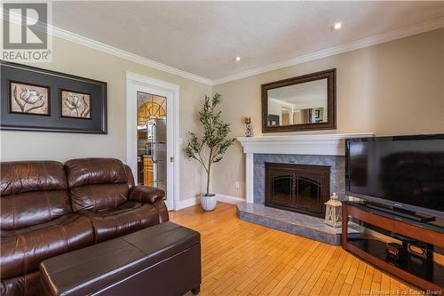 213 Orlean, Dieppe, NB - Indoor Photo Showing Living Room With Fireplace