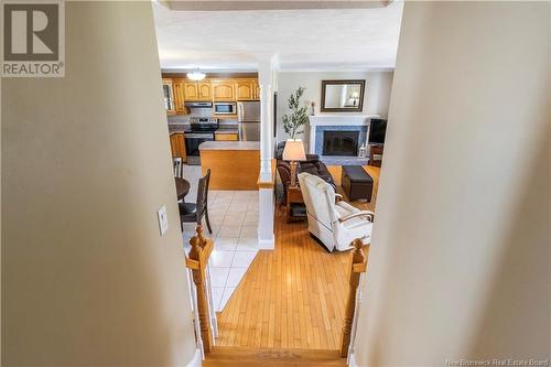 213 Orlean, Dieppe, NB - Indoor Photo Showing Other Room With Fireplace