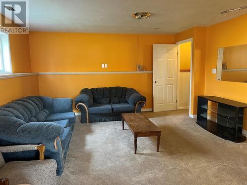 5123 42 Street Ne, Chetwynd, BC - Indoor Photo Showing Living Room With Fireplace