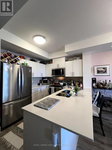 404 - 4 Kimberly Lane, Collingwood, ON - Indoor Photo Showing Kitchen With Double Sink