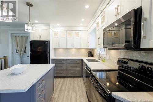 109 Rue Des Erables, Drummond, NB - Indoor Photo Showing Kitchen With Double Sink