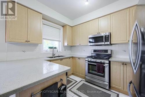 4454 Centretown Way, Mississauga, ON - Indoor Photo Showing Kitchen With Stainless Steel Kitchen With Double Sink