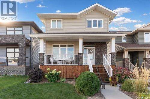 143 Maningas Bend, Saskatoon, SK - Outdoor With Deck Patio Veranda With Facade