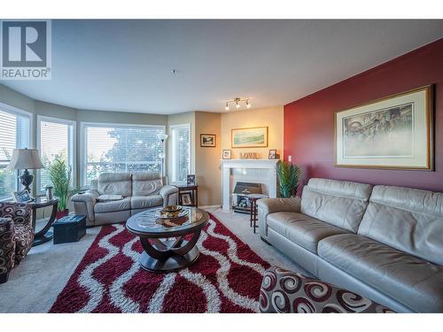 1445 Halifax Street Unit# 104, Penticton, BC - Indoor Photo Showing Living Room With Fireplace