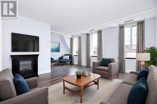 504 - 135 Maitland Street, Toronto, ON - Indoor Photo Showing Living Room With Fireplace