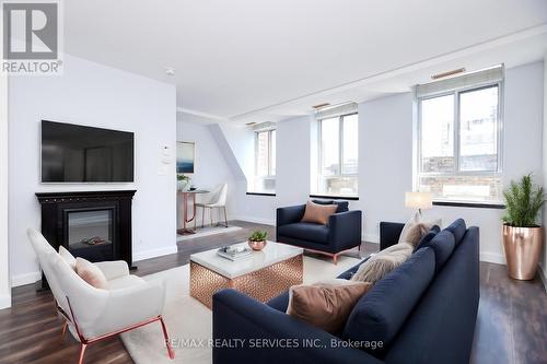 504 - 135 Maitland Street, Toronto, ON - Indoor Photo Showing Living Room With Fireplace