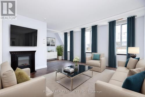 504 - 135 Maitland Street, Toronto, ON - Indoor Photo Showing Living Room With Fireplace